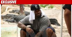 NFL Star STRADDLES Giant Alligator -- What a Croc!