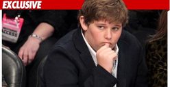 Arnold & Maria's Son Hospitalized -- Surfing Accident
