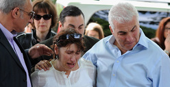 Amy Winehouse's Parents Visit Apartment Shrine
