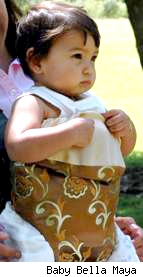 Rachel Weisz's Sugar & Spice Brown Baby Bjorn cover
