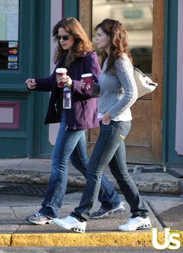 Katie Holmes walks with friend