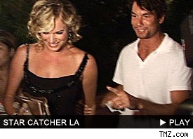 Rebecca Romijn & Jerry O'Connell