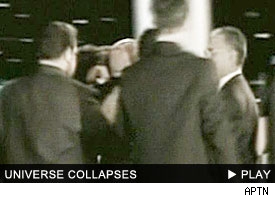 Miss Universe Collapses: Click to watch