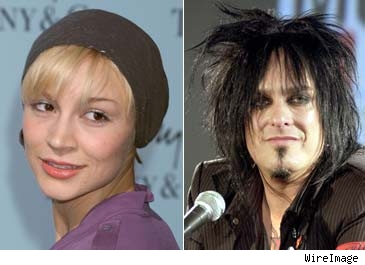 Samaire Armstrong and Nikki Sixx