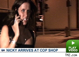 Nicky Hilton arrives at police station: Click to watch