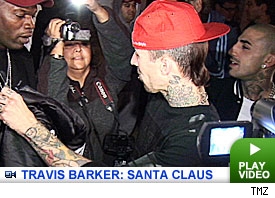 Travis Barker plays Santa.