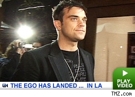 Robbie Williams: Click to watch