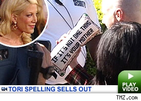 Tori Spelling Sells Out: Click to Watch