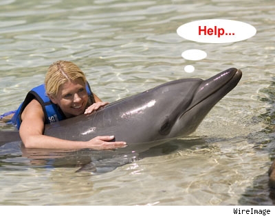 Tara Reid and Dolphin