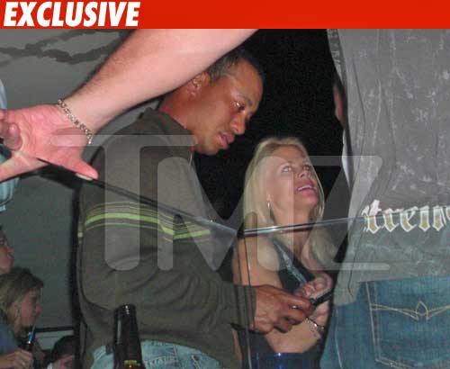 Tiger Woods -- Distracted Husband Tiger Woods -- Distracted Husband