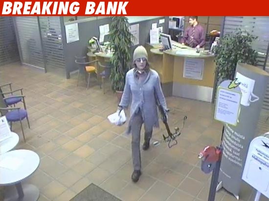 Androgynous Person Robs Bank with Crossbow Crossbow and Bank