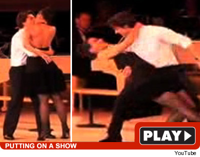 tom cruise and katie holmes kissing. Tom Cruise unleashed his inner