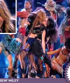 Miley Kisses Girl ... Likes It?