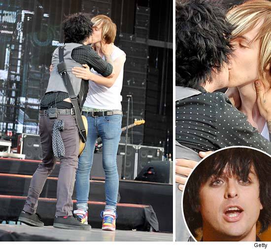 Green Day lead singer Billie Joe Armstrong pulled an Adam Lambert and kissed a male fan on the lips while on stage at a concet in England on Wednesday.