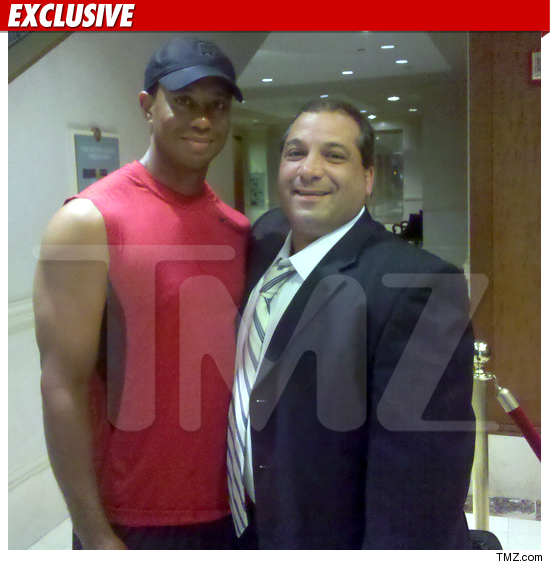 0903_TIGER_WOODS_ARMS_TMZ_EX