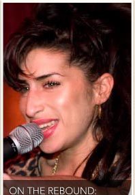 Winehouse Hits Stage, Looks Healthy!