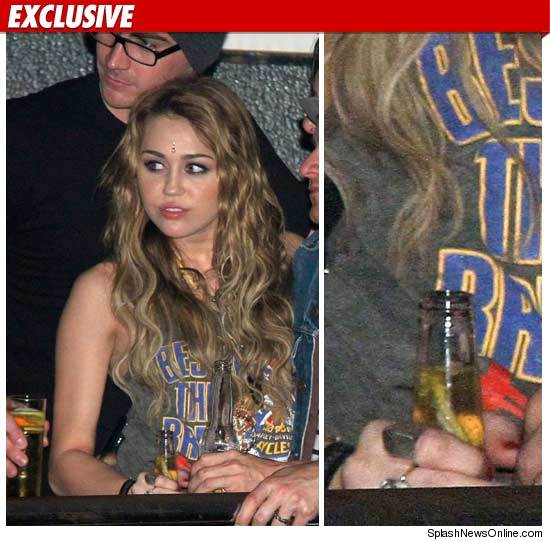 1105_miley_cyrus_Splash_EX