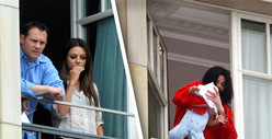 Mila Kunis Dangles From MJ's Hotel Balcony