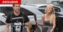 Hugh Hefner's Ex-Fiancee -- Shacking Up with Dr. Phil's Son