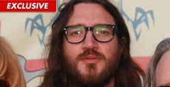 Ex-Chili Peppers Guitarist -- Protected from 'Drunk' Stalker