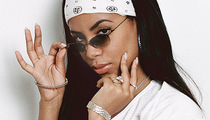 Remembering Aaliyah: Stars React 10 Years After Her Death
