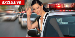 Lucy Liu -- Bulletproof Vest for LAPD Tour of Inner City