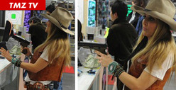 Brooke Mueller -- Armed and Looking Dangerous
