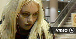 Lindsay Lohan Returns from Hawaii -- Parties at Jay-Z Concert