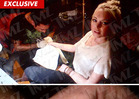 Lindsay Lohan -- The Girl with a New Wrist Tattoo [PHOTO]
