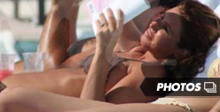 Rachel Uchitel Does a Bikini Bump