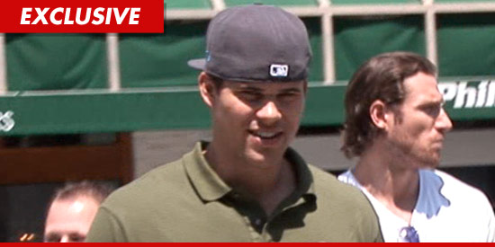 Kris Humphries with a baseball hat