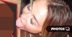 Miley Cyrus Goes to Town on Birthday Penis Cake
