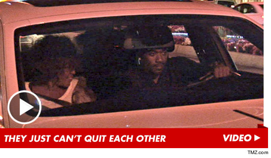Whitney Houston and Ray J in a car together
