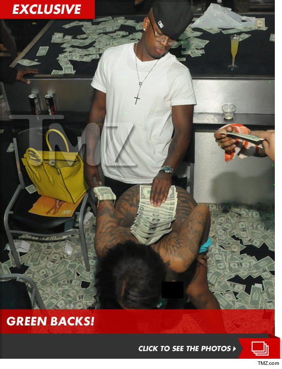 Ne-Yo makes it RAIN at a strip club