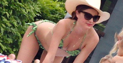 Miranda Kerr Gets Touchy-Feely Down Under