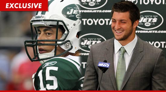 0329-scotty-mcknight-tim-tebow-getty-ex