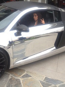 Kim Kardashian Takes Scott Disick's New Chrome Car for a Spin