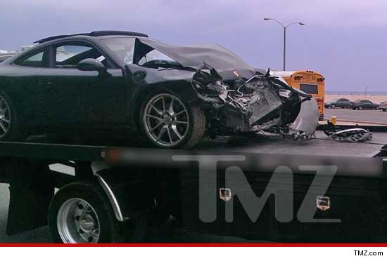 Lindsay Lohans wrecked porsche in tow