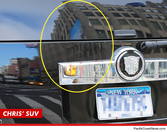 What appears to be blood splattered on the back of Chris Browns car