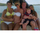 Kim Zolciak, 7 Months Pregnant, Shows Off Baby Bump In a Bikini!
