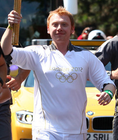 "Harry Potter" Star Rupert Grint Carries the Olympic Torch!