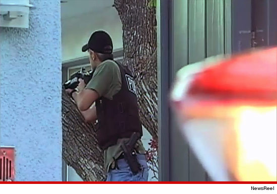 0802_miley_cyrus_swat_newsreel