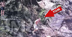 Tom Brady Throws Himself Off a Cliff [PHOTOS]