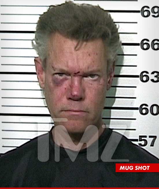 [Image: 0808-randy-travis-mug2-1.jpg]