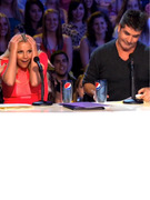 "Oops!" Britney Spears Makes Herself Blush in "X Factor" Promo