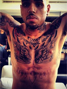 Chris Brown Gets New Tattoo In Same Spot as Rihanna's New Tattoo