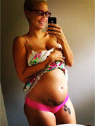 Amber Rose Shows Off Her Growing Baby Belly