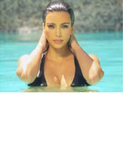 Kim Kardashian Sizzles In Bikini, Shoots In Miami