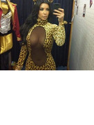 Kim Kardashian Tries On Very Revealing Halloween Costume!