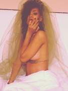 Rihanna Posts Topless Post-Halloween Pic